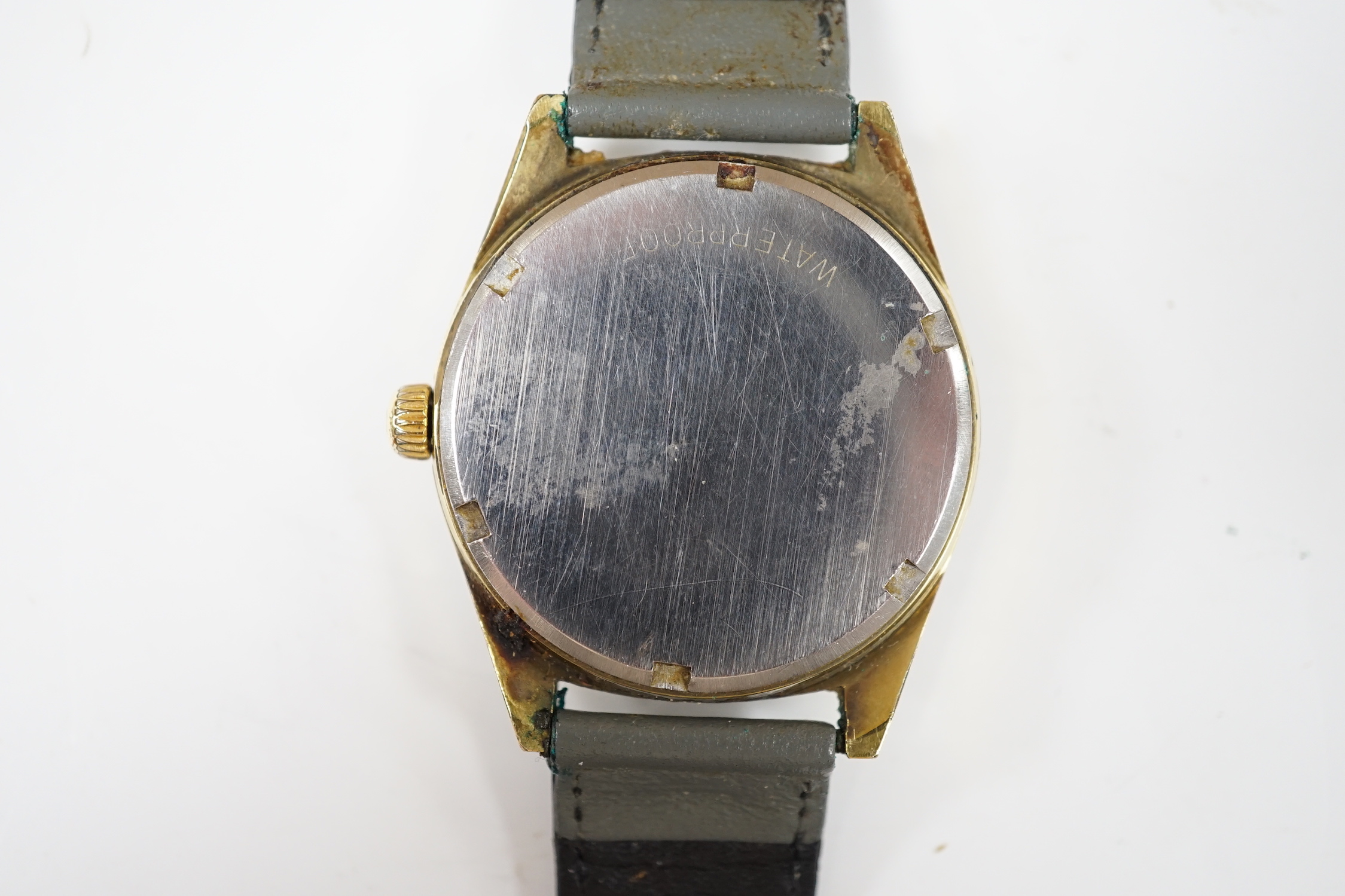 A gentleman's steel and gold plated Omega manual wind wrist watch, with date aperture, on associated strap, case diameter 35mm, no box or papers.